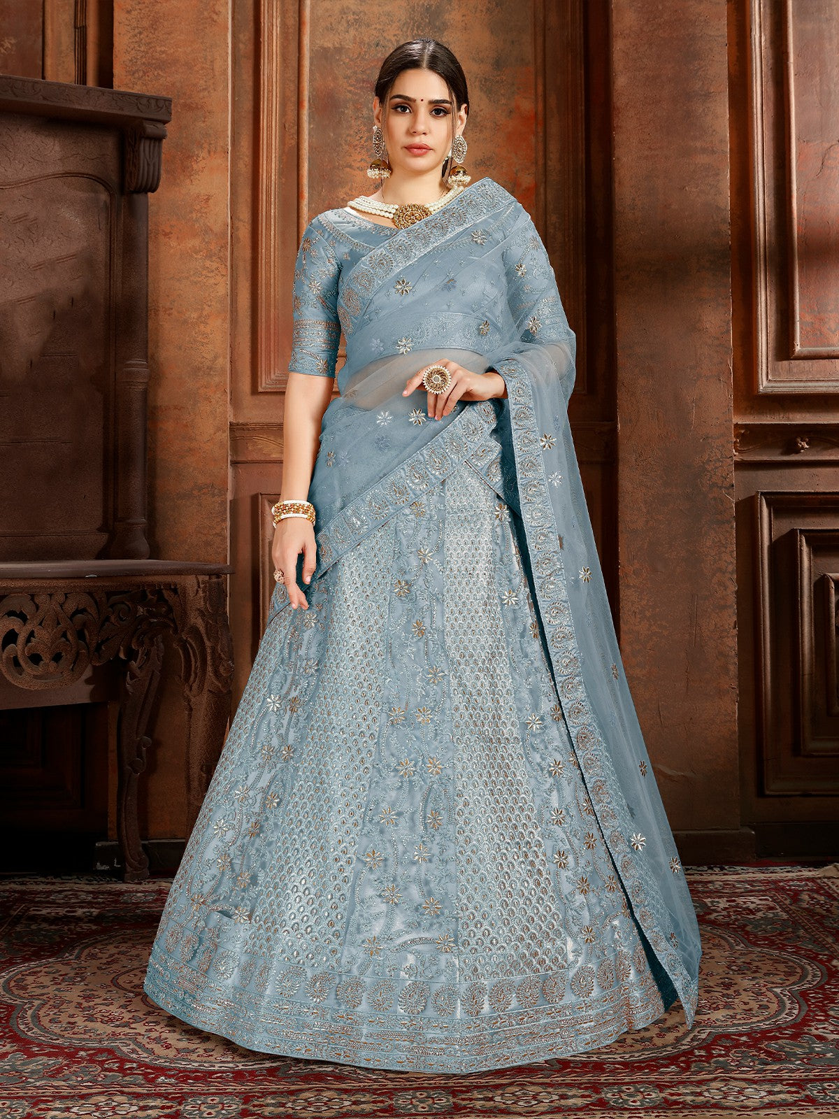 Odette Blue Embroidered Soft Net Semi Stitched Lehenga With Blouse For Women