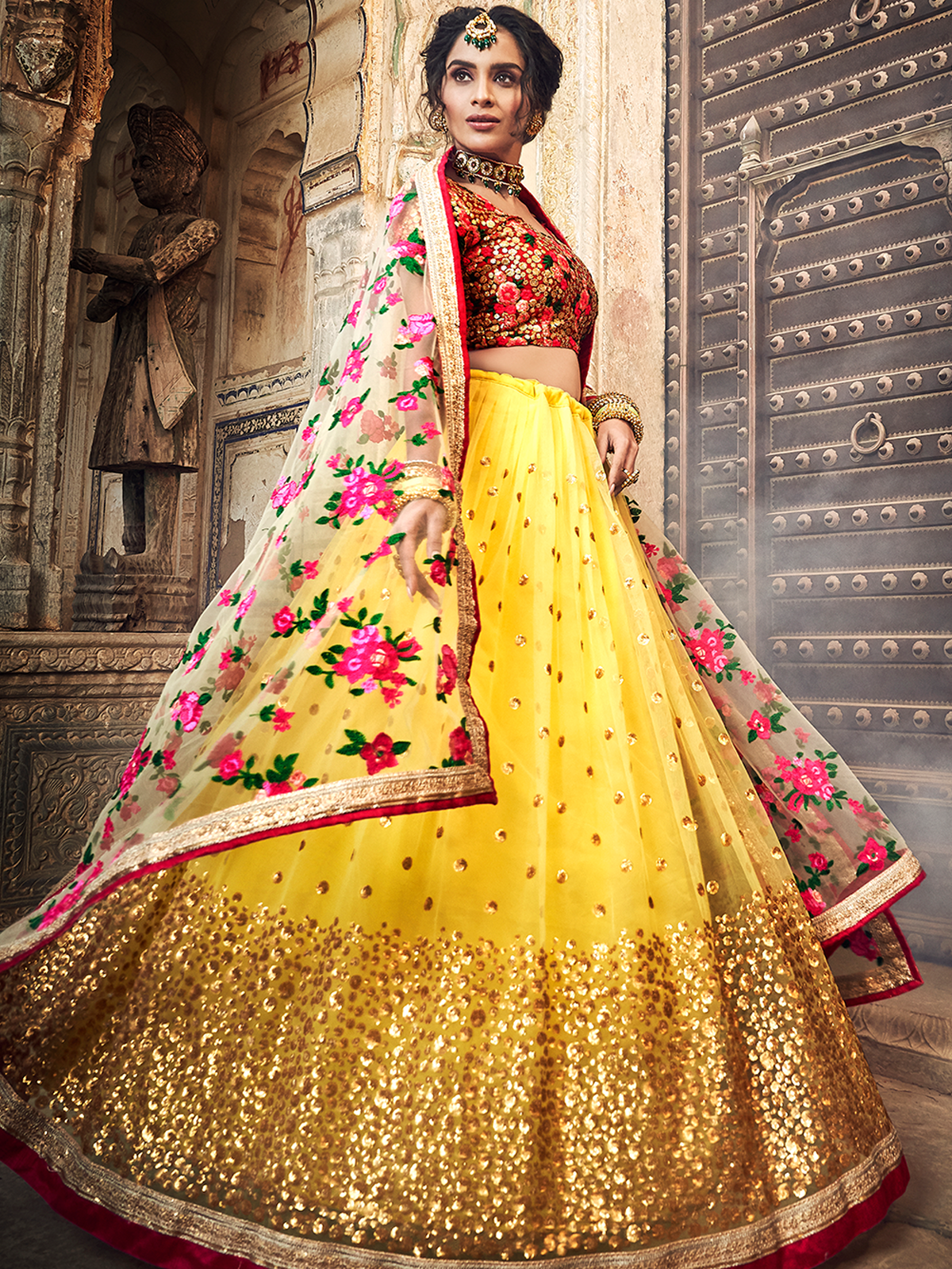 Odette Women Yellow Embroidered Soft Net Semi Stitched Lehenga With Unstitched Blouse