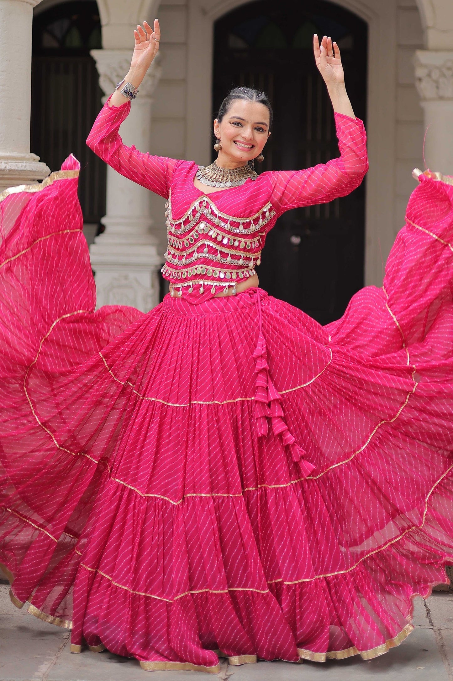 Pink Flared Georgette Chaniya Choli with Leheriya Print Work