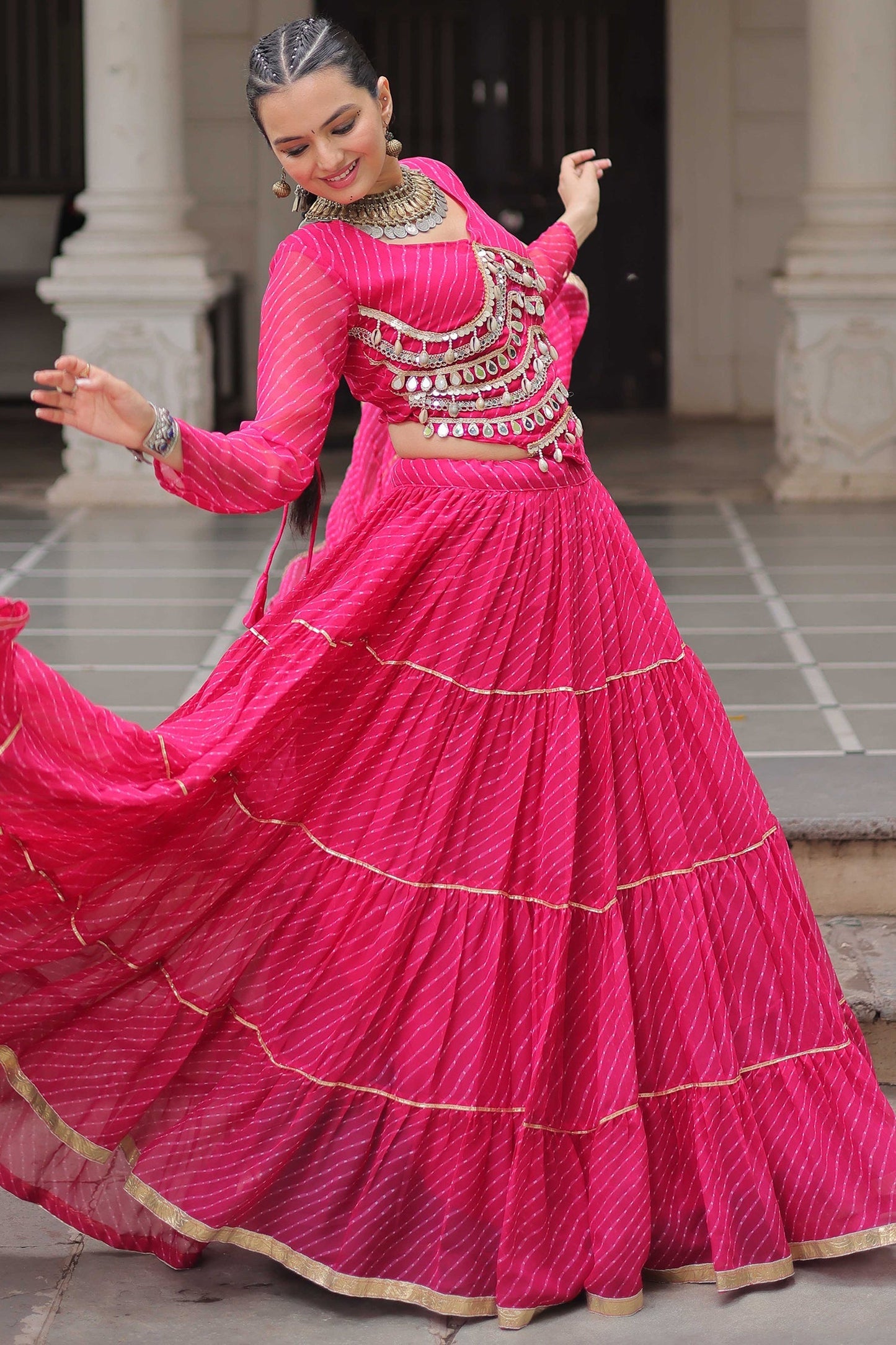 Pink Flared Georgette Chaniya Choli with Leheriya Print Work