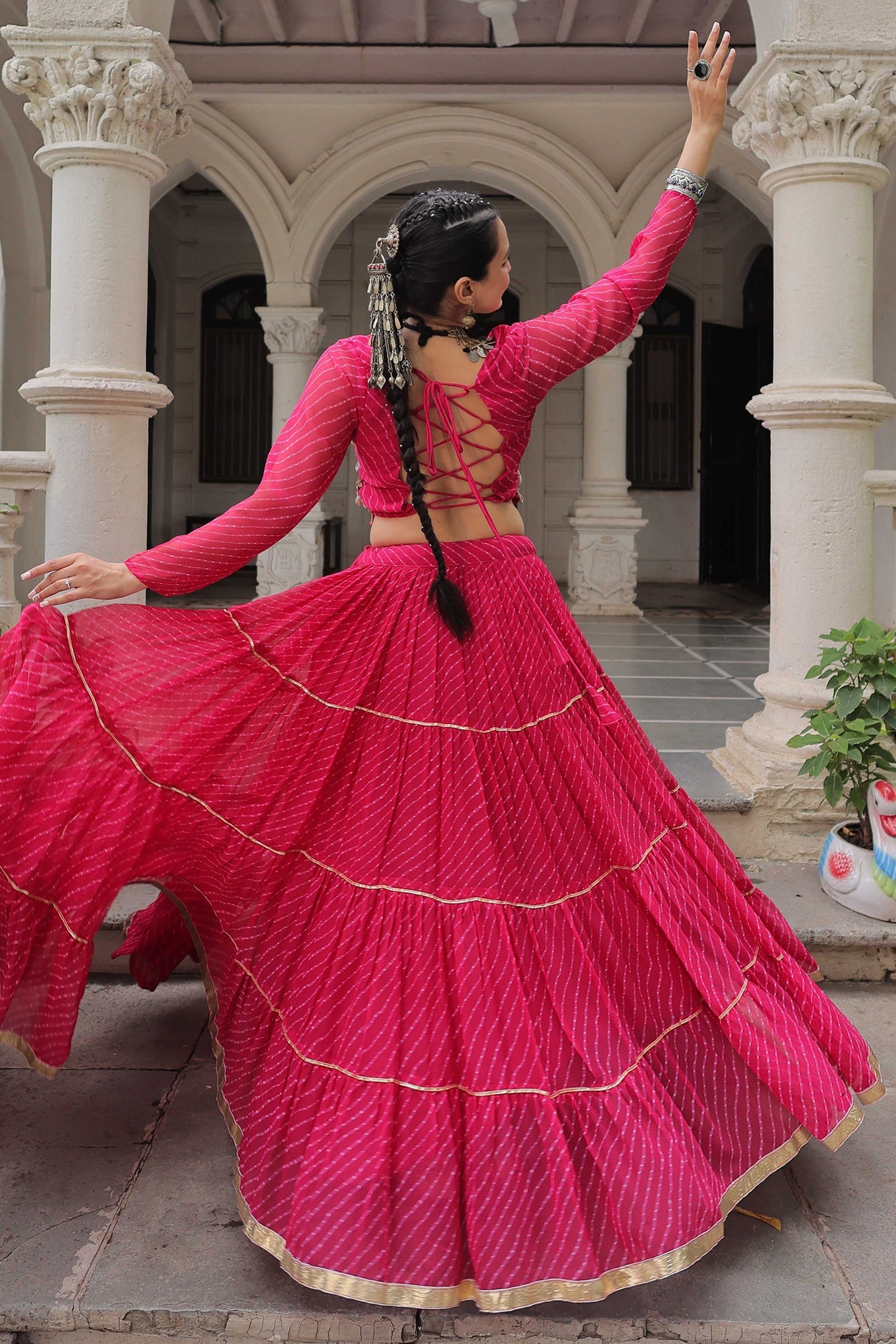 Pink Flared Georgette Chaniya Choli with Leheriya Print Work