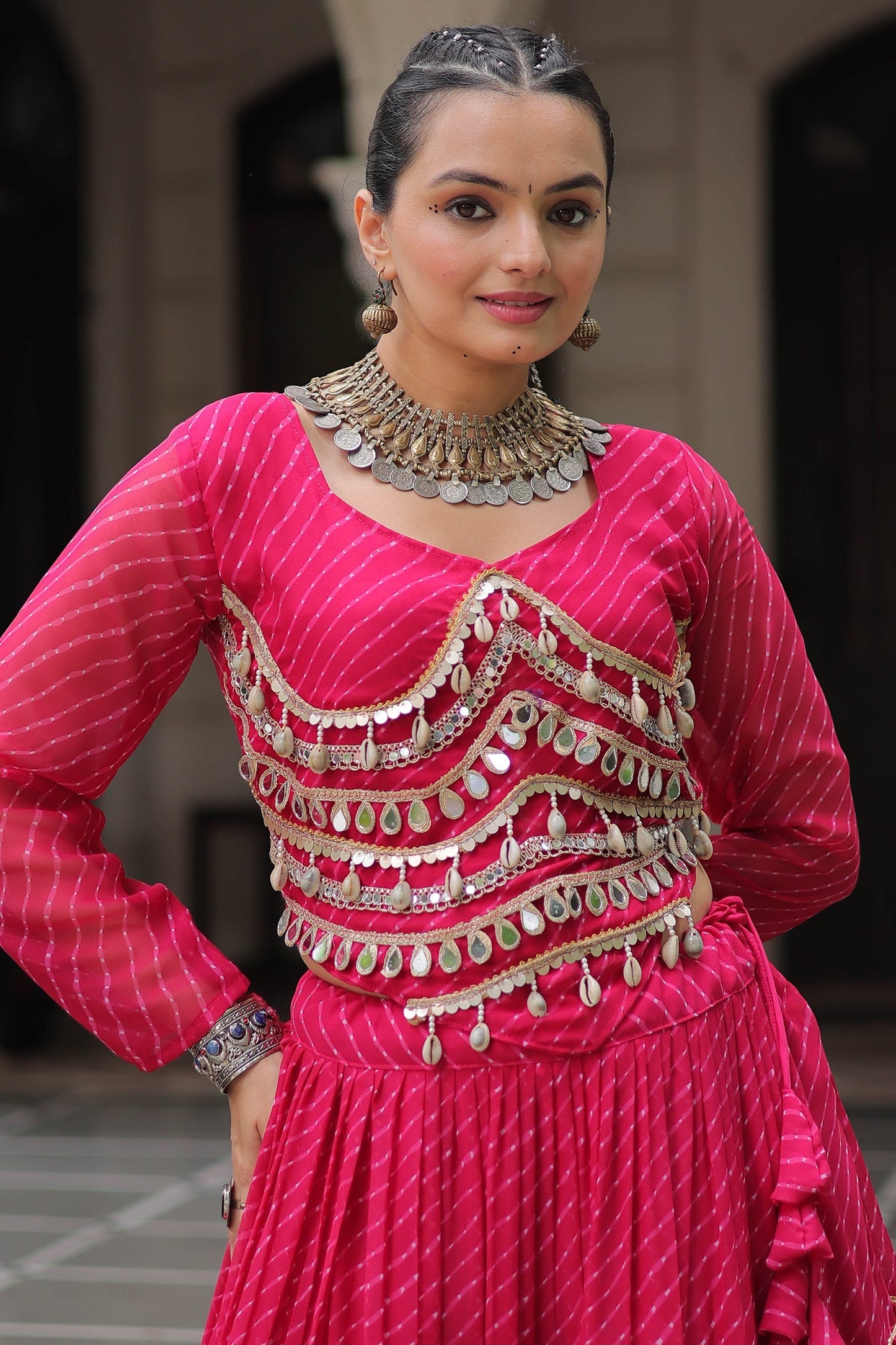 Pink Flared Georgette Chaniya Choli with Leheriya Print Work