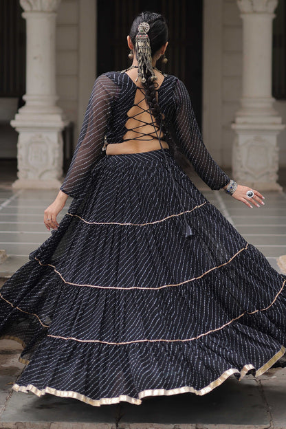 Black Flared Georgette Chaniya Choli with Leheriya Print Work