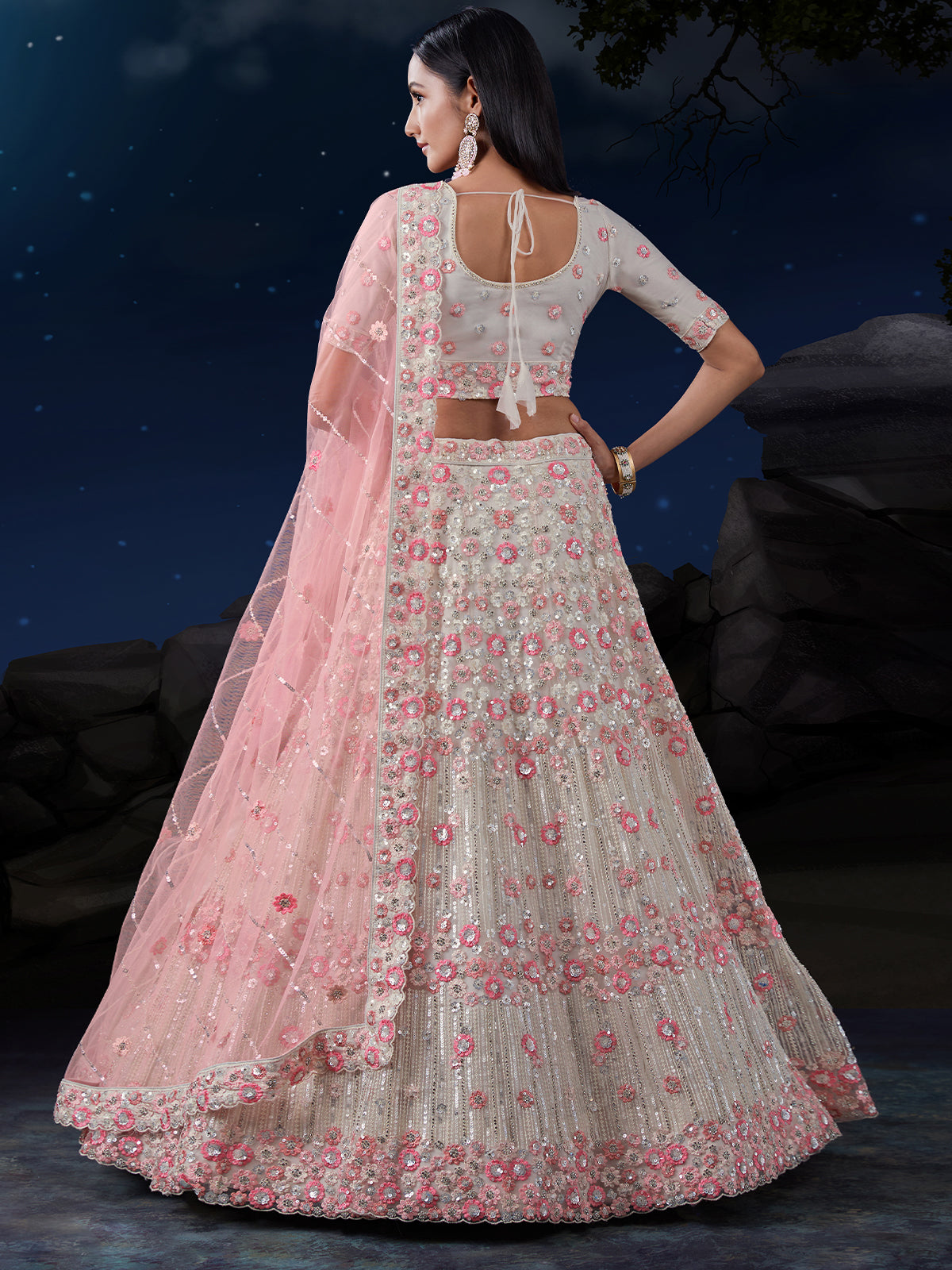 Odette Off White Embroidered Soft Net Semi Stitched Lehenga With Blouse For Women