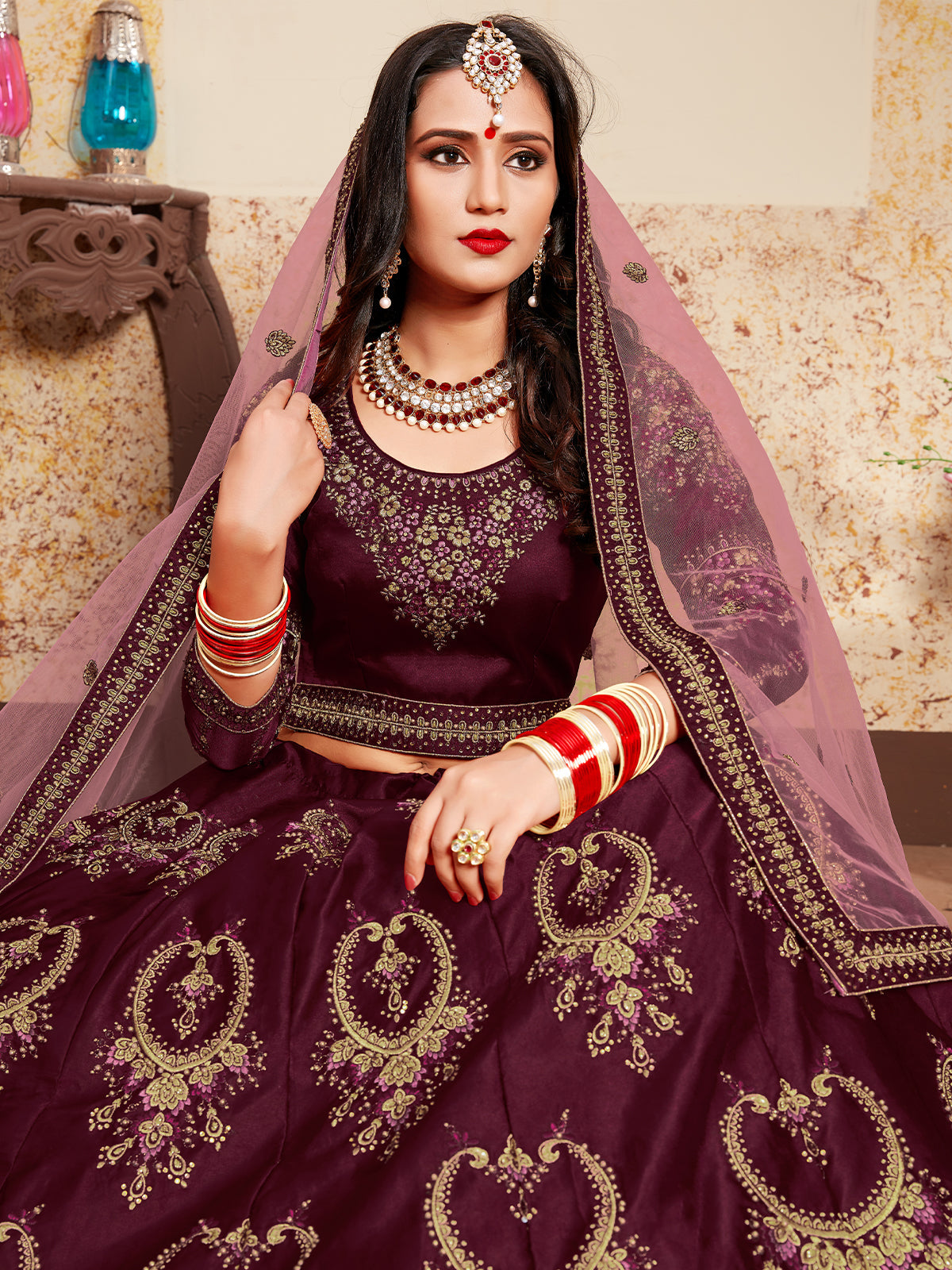 Odette Women Soft Net Maroon Semi Stitched Lehenga With Unstitched Blouse