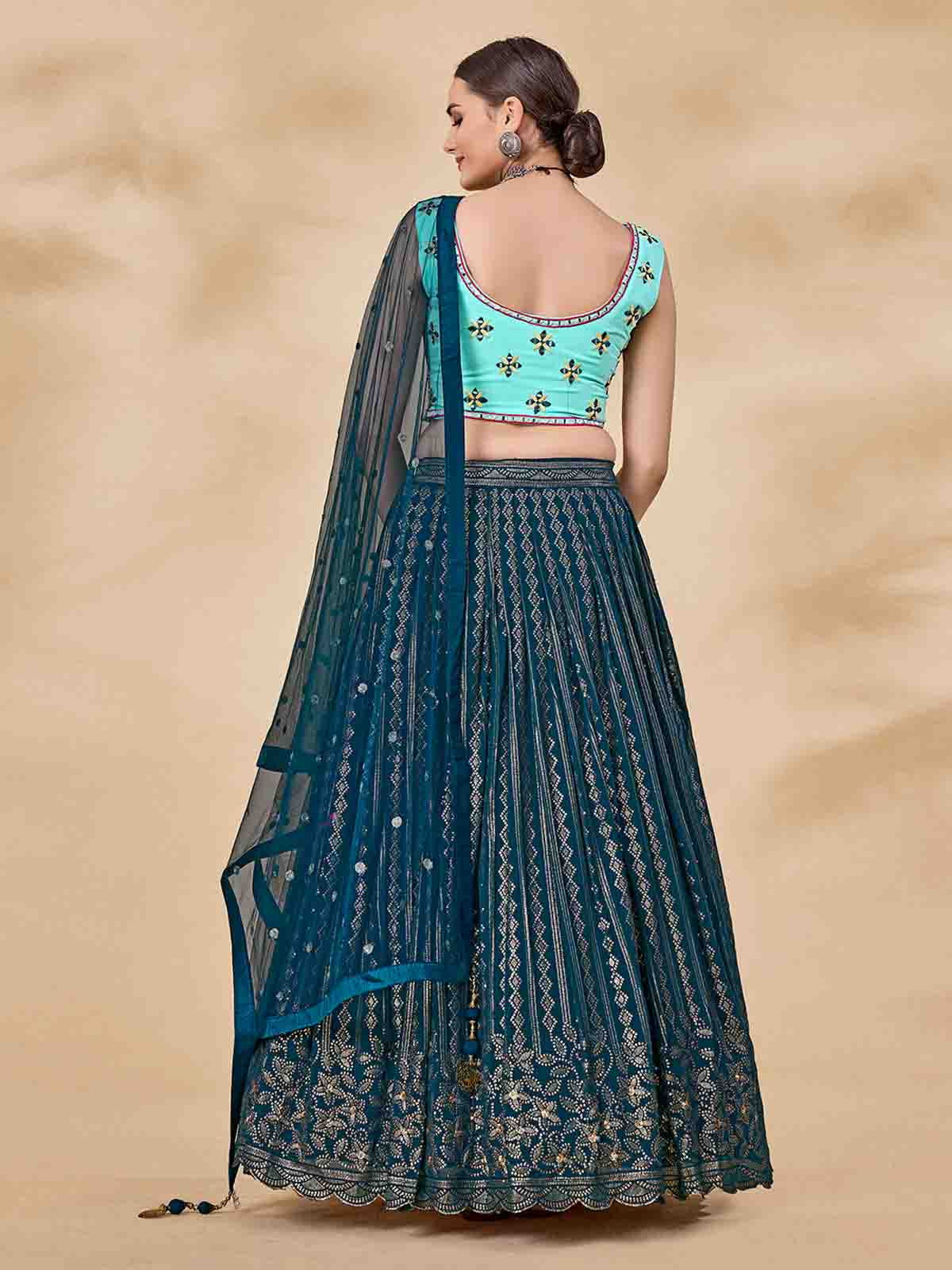 Odette Women Teal Embroidered Semi Stitched Lehenga With Unstitched Blouse