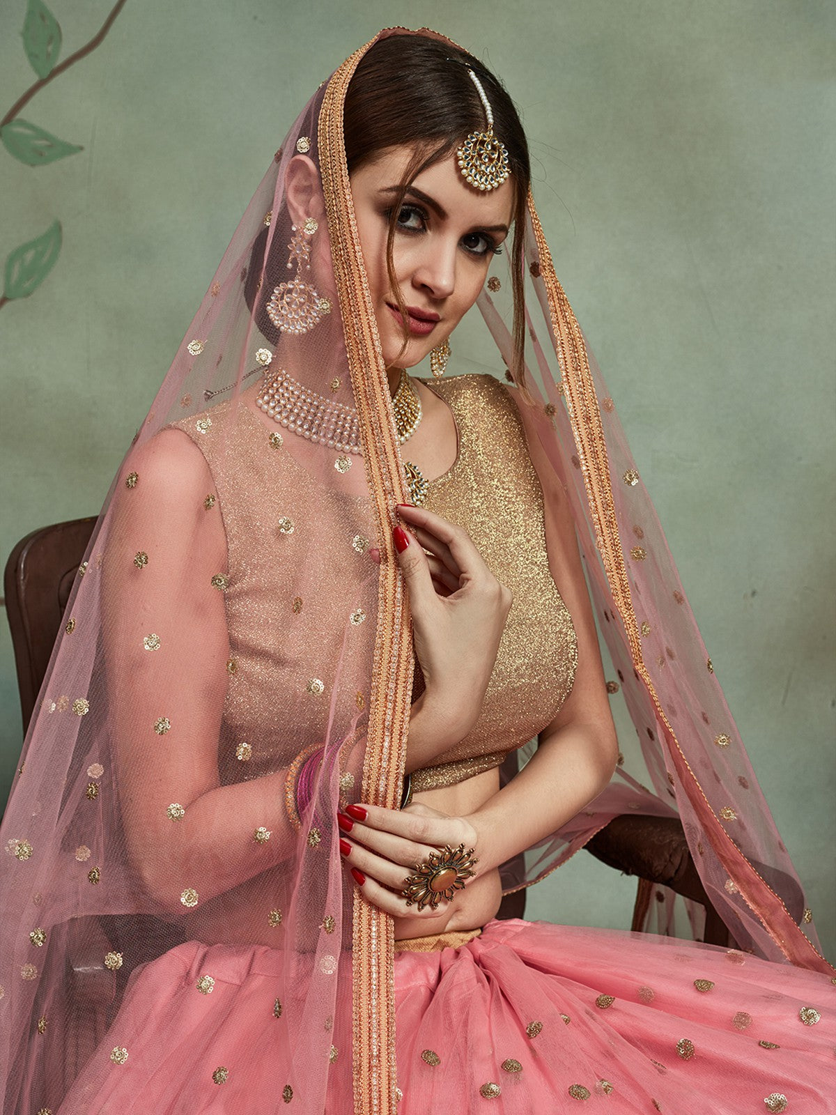 Odette Women Peach Soft Net Seqins Semi Stitched Lehenga With Unstitched Blouse