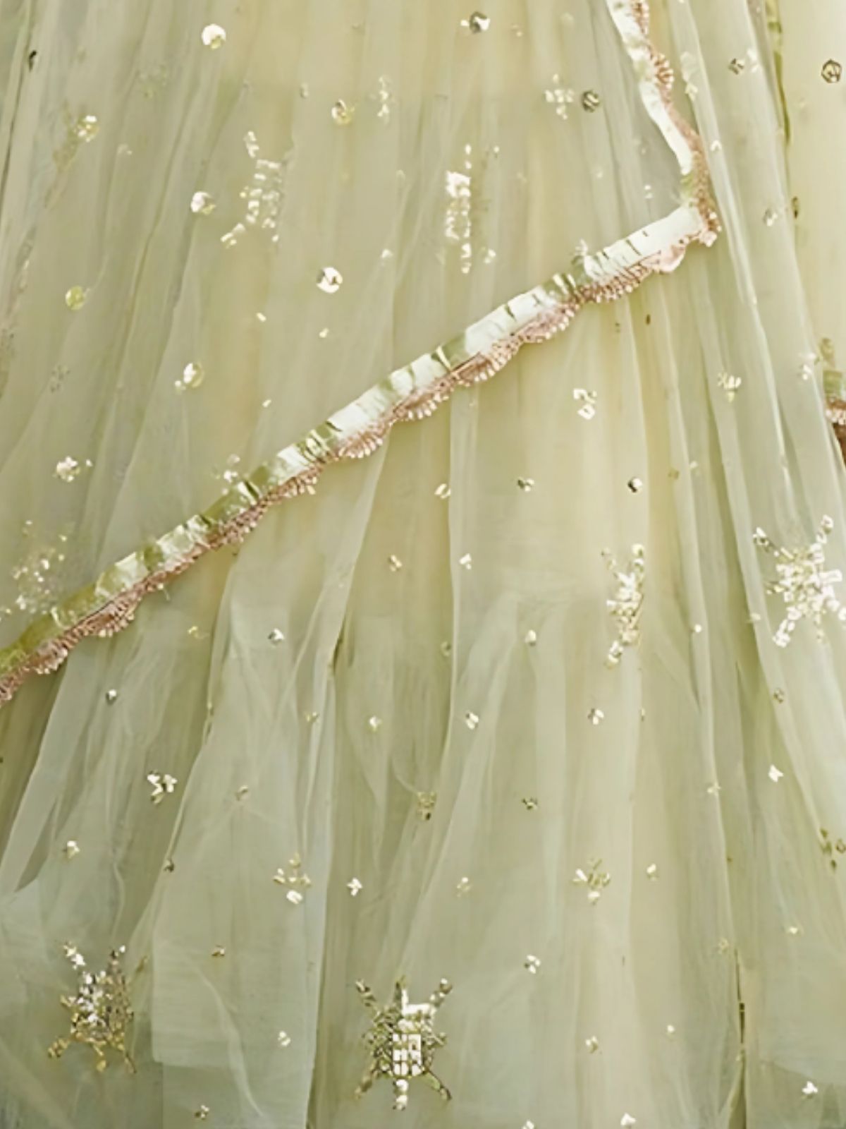 Odette Pista Green Net Embellished Semi-Stitched Lehenga For Women