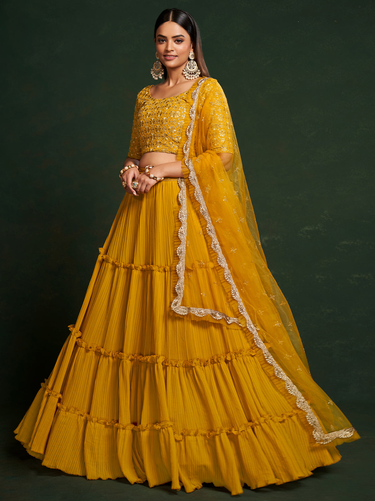 Odette Women Mustard Faux Georgette Embroidered Semi Stitched Lehenga Choli