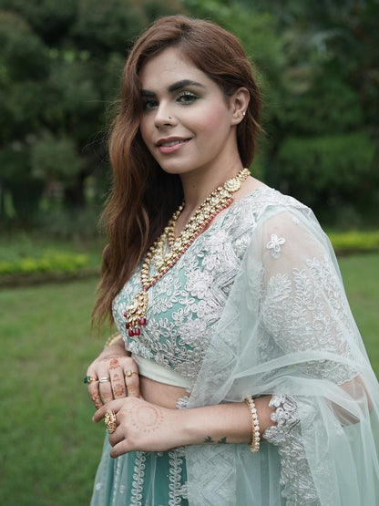 Odette Women Green Net Semi Stitched Lehenga With Unstitched Blouse