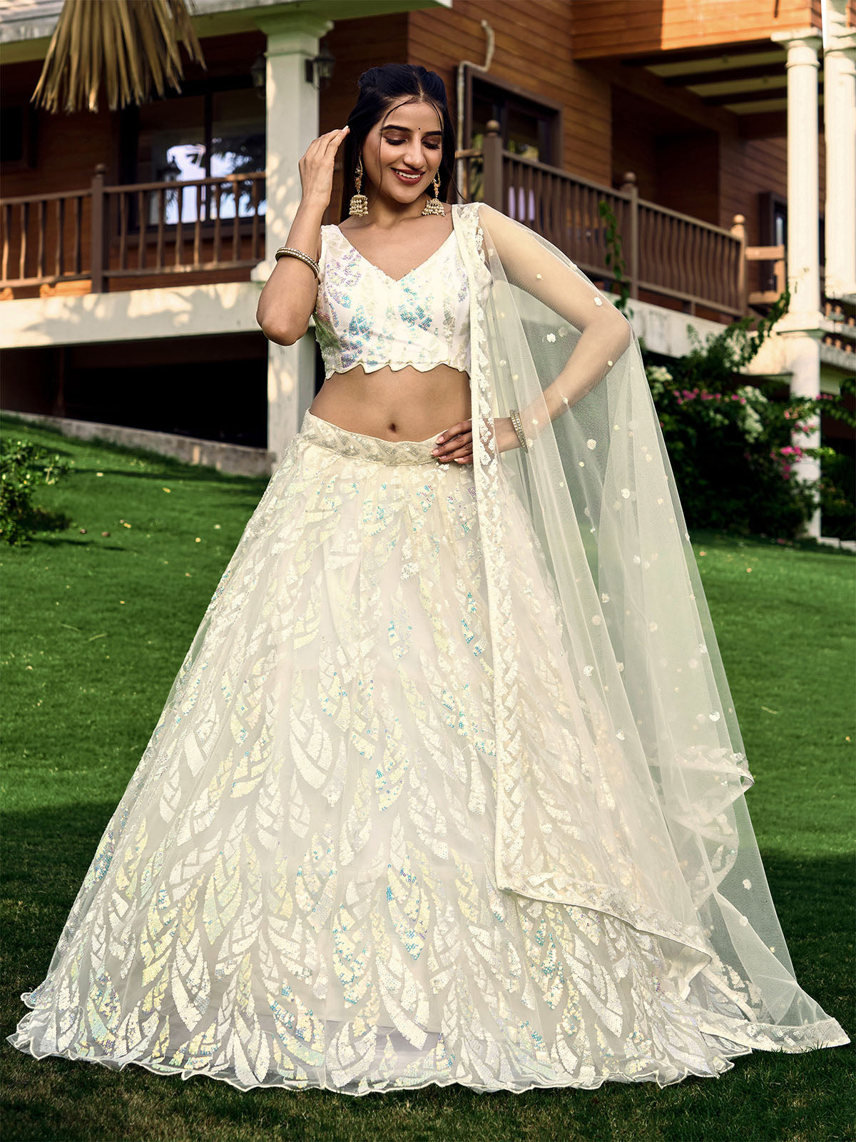 Odette Off White Blue Soft Net Embellished Semi Stitched Lehenga With Unstitched Blouse For Women