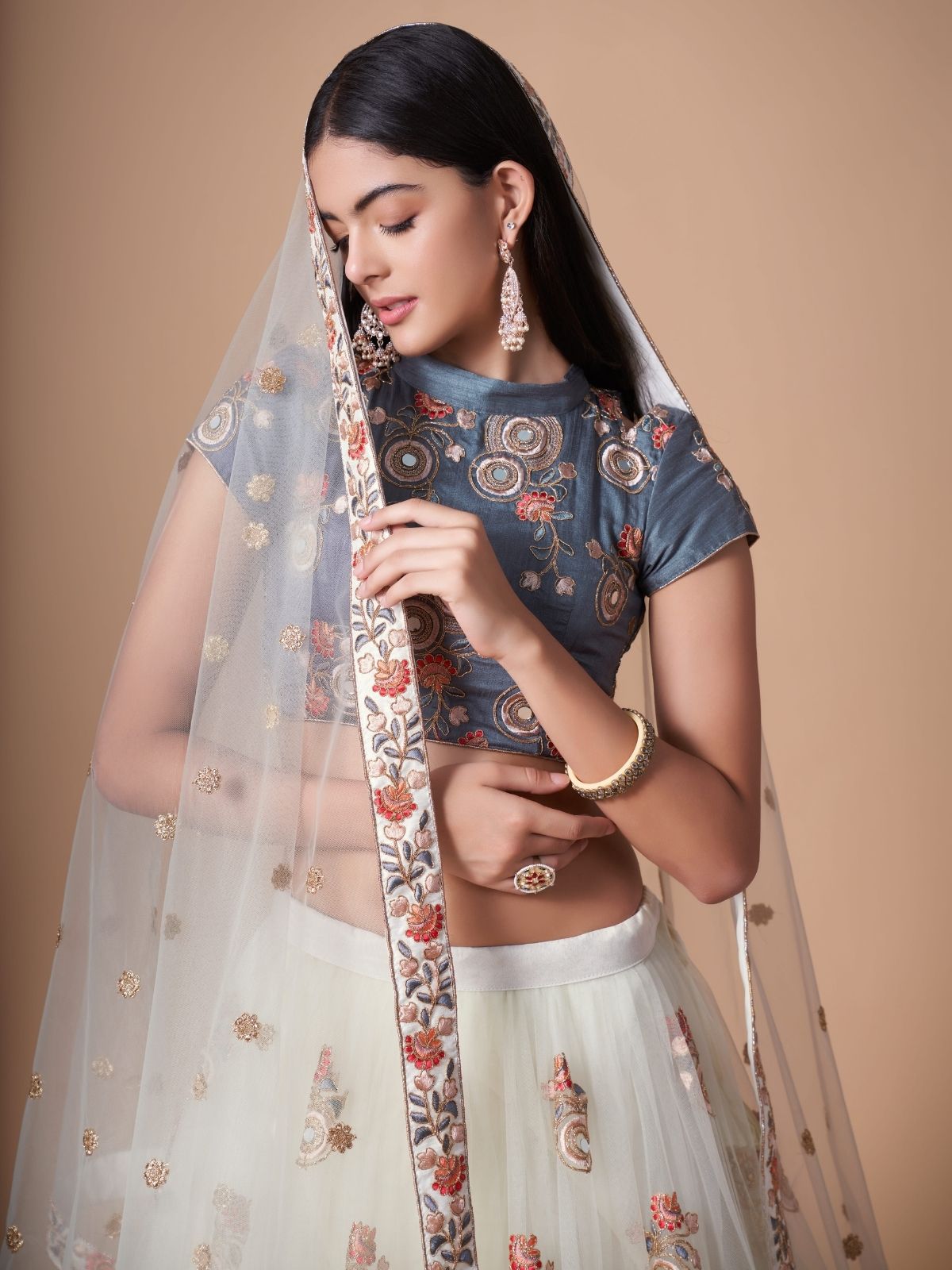 Odette Off White Soft Net Embroidered Semi Stitched Lehenga With Blouse For Women